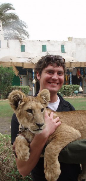 Dallas holding a lion